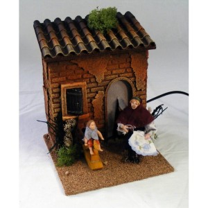 (29/061) Matka z dzieckiem przed domem, figura ruchoma, 220V