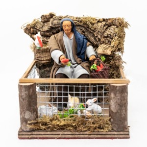 (RMUC) RUCHOMA FIGURA DO SZOPKI - Mężczyzna karmi swoje króliki, do figur o wysokości 15cm